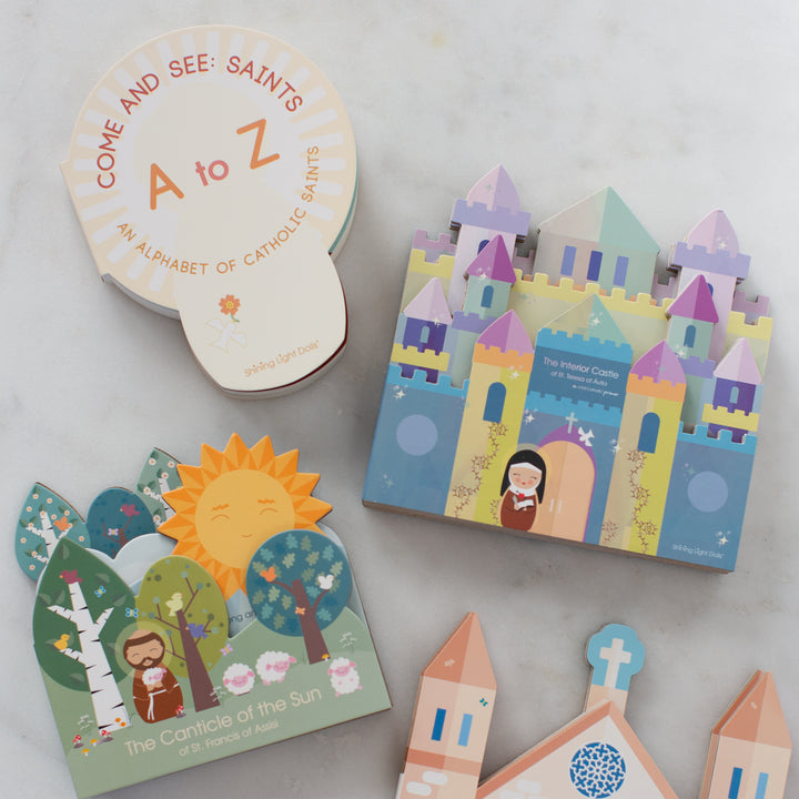 Come and See: Saints A to Z - An Alphabet of Catholic Saints - shaped board book - Shining Light Dolls