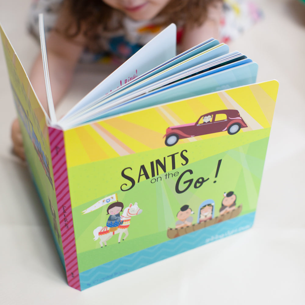 
                  
                    Saints on the Go! Board Book - Shining Light Dolls
                  
                